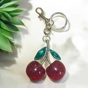 NWOT Unbranded Peach Cherry Keychain with Gold Tone and Green Accents